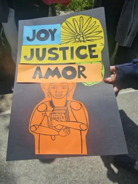 Poster found at the Belonging Conference with the slogan 