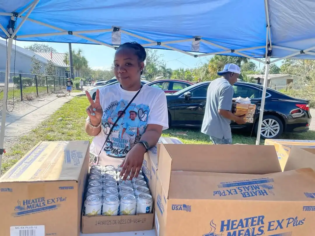 Volunteer getting food ready for survivors of Milton